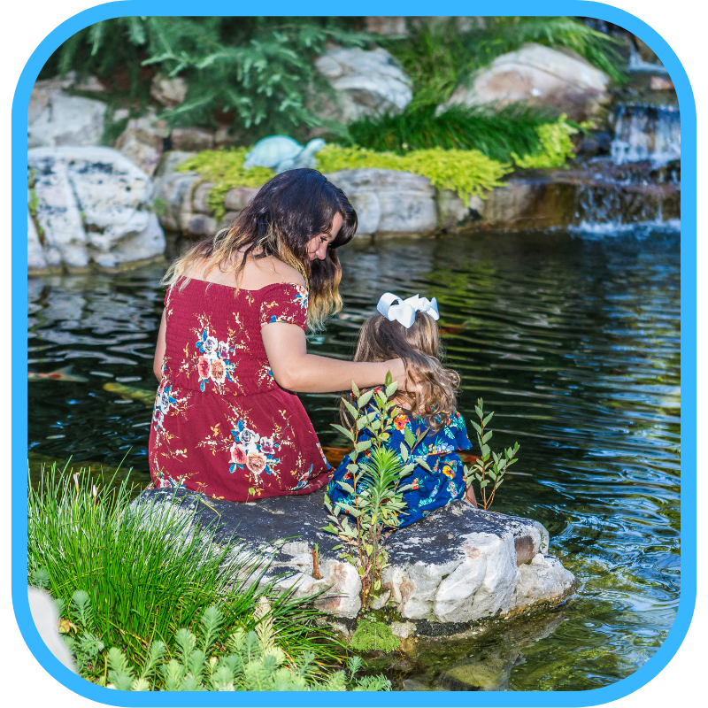 Family moment at pond