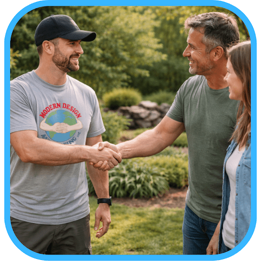 MDA team member shaking hands with homeowners in front of completed pond